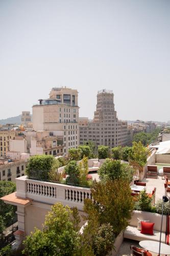 a view of a city skyline with tall buildings at Almanac Barcelona in Barcelona