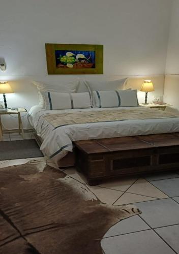 Katil atau katil-katil dalam bilik di Herb Garden Guesthouse