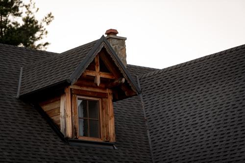 a window on the roof of a house at Osada Dębno 