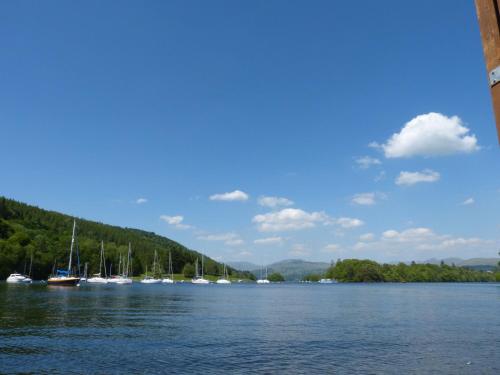 a view of a lake with boats in the water at Aspen Boutique in Windermere