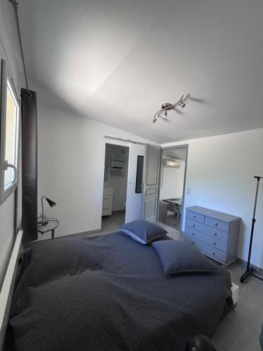 En eller flere senge i et værelse på Le pavé