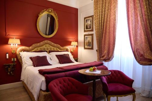 Postel nebo postele na pokoji v ubytování Stanze del David Place