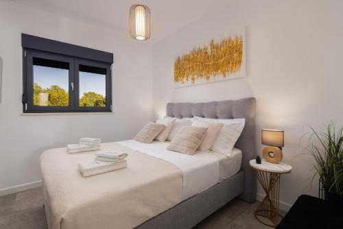 Ένα ή περισσότερα κρεβάτια σε δωμάτιο στο Villa Harmony