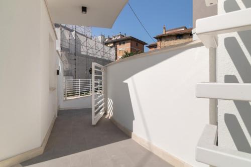 a view from the balcony of a white building at Palladio13 in San Benedetto del Tronto