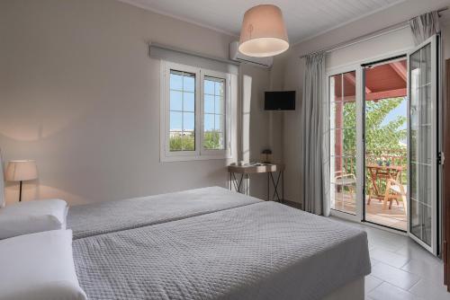 Cama o camas de una habitación en Lemonia Accommodations