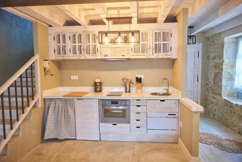 Køkken eller tekøkken på MIRADORIO RURAL BOUTIQUE Apto MAR DE FONDO