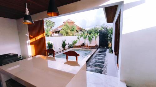 Φωτογραφία από το άλμπουμ του Tresna Tiga Villa σε Bedahulu