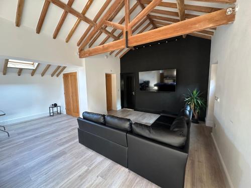 Sleeps18 character barnsにあるテレビまたはエンターテインメントセンター