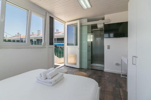 Postel nebo postele na pokoji v ubytování Casa Azeitao