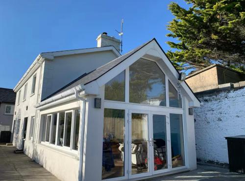an extension to a house with sliding glass doors at Enniscrone House in Enniscrone