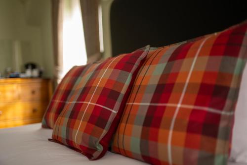 Ένα ή περισσότερα κρεβάτια σε δωμάτιο στο Eildon Guest House