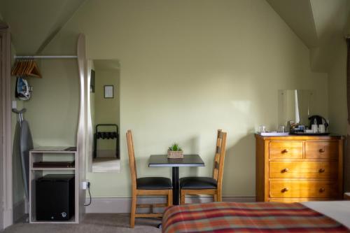 Ένα ή περισσότερα κρεβάτια σε δωμάτιο στο Eildon Guest House