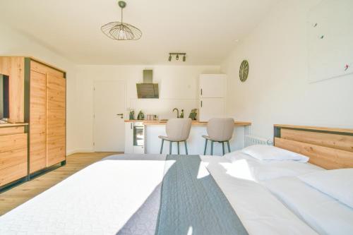 Katil atau katil-katil dalam bilik di Veselé Apartmány Lipno