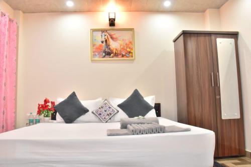 Letto o letti in una camera di Misty Hills Homestay Kasuali