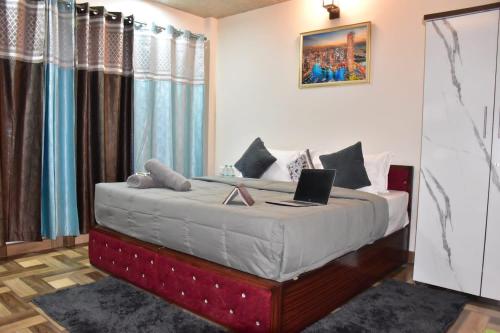 Letto o letti in una camera di Misty Hills Homestay Kasuali