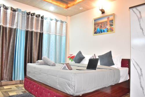 Letto o letti in una camera di Misty Hills Homestay Kasuali