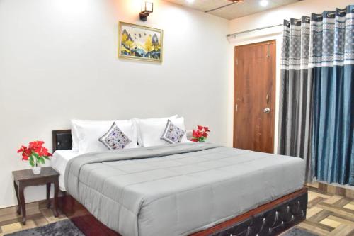 Letto o letti in una camera di Misty Hills Homestay Kasuali