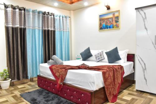 Letto o letti in una camera di Misty Hills Homestay Kasuali