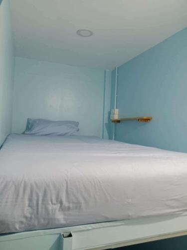 Ένα ή περισσότερα κρεβάτια σε δωμάτιο στο Tropical Reserve Hostel