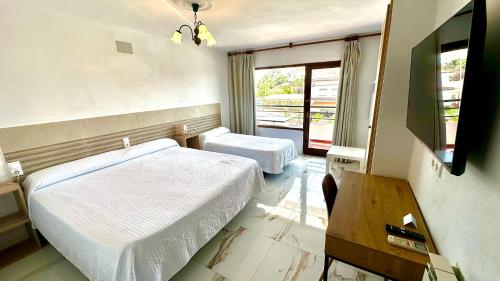 Hotel Sorbasにあるベッド