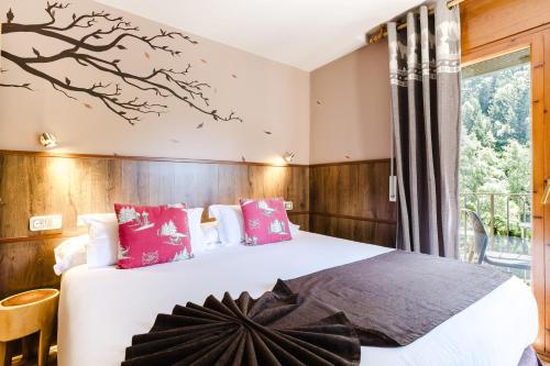 Cama o camas de una habitación en Apartaments La Neu