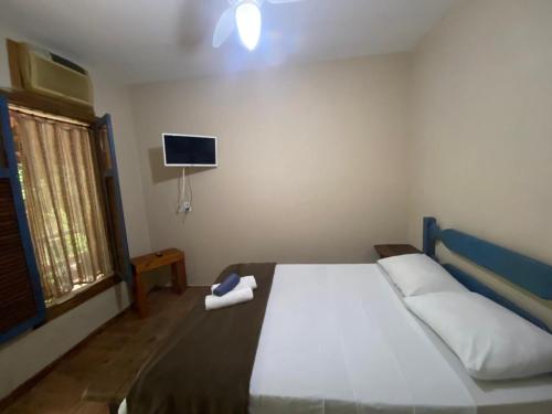 Katil atau katil-katil dalam bilik di Pousada & Hostel Bicho Preguiça