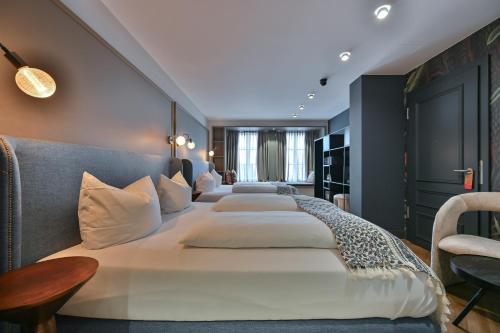 Cama o camas de una habitación en Hotel Sonne