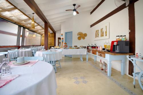 Restoran atau tempat lain untuk makan di VELINN Pousada Guarubela Villa Vittoria