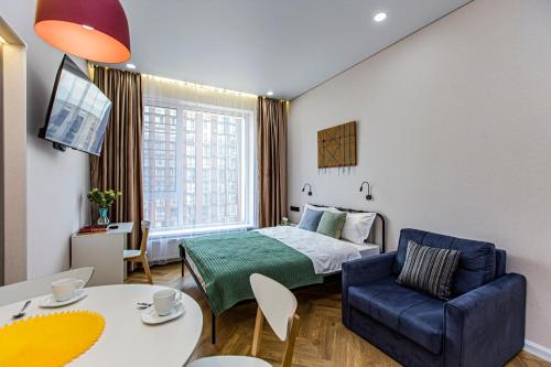 En eller flere senge i et værelse på ЖК ESTET, рядом MEGA Alma-Ata