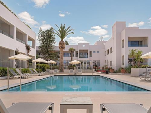 an image of a swimming pool at a hotel at Creta Royal - Adults Only in Skaleta