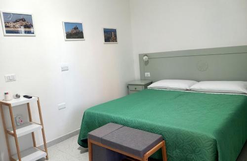Ένα ή περισσότερα κρεβάτια σε δωμάτιο στο B&B Feronia