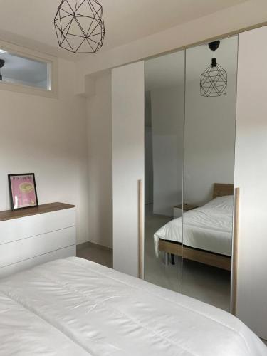 Una cama o camas en una habitación de FlyWish - Salerno Costa d'Amalfi Airport