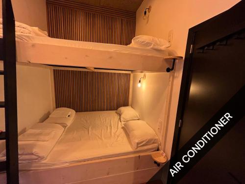 Postel nebo postele na pokoji v ubytování BED Pepin