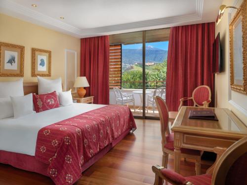 Ένα ή περισσότερα κρεβάτια σε δωμάτιο στο Hotel Botanico y Oriental Spa Garden