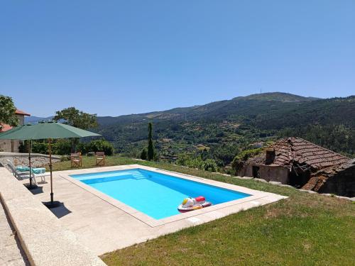 Πισίνα στο ή κοντά στο Casa do Eirô