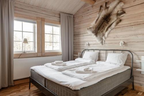 Postel nebo postele na pokoji v ubytování 12 person holiday home in Stöten mountains