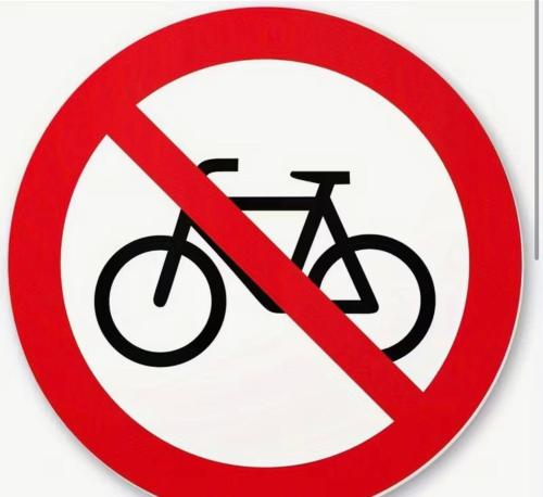 a no bikes allowed sign on a white background at Poetica Verona in Verona