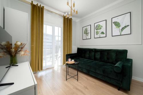Dark Green Apartment in Wrocław Center with Desk and Balcony by Noclegi Renters