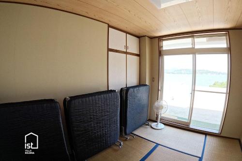Un lugar para sentarse en IST Villa 06 Beachfront for 16