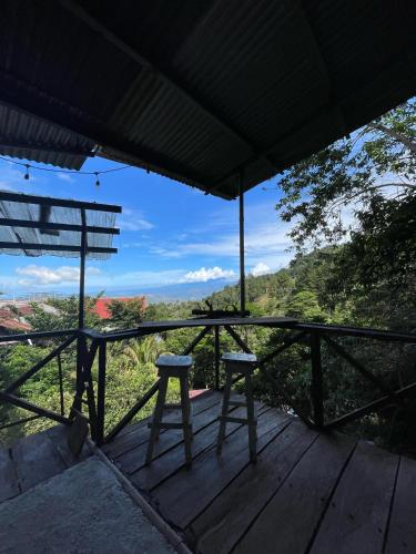Un balcón o terraza en Roots Casa Rústica