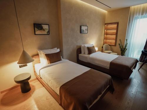 Katil atau katil-katil dalam bilik di Zyra boutique hotel