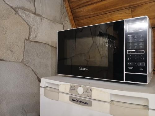 Bendito Vale Hospedariaにあるテレビまたはエンターテインメントセンター