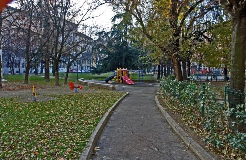 a path in a park with a playground at Hotel Aspromonte in Milan