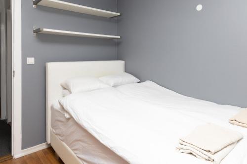 Ένα ή περισσότερα κρεβάτια σε δωμάτιο στο Summerday Guesthouse