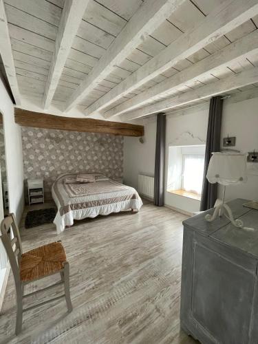 Postel nebo postele na pokoji v ubytování Gîte La Nuit Étoilée chez Champagne Mathelin