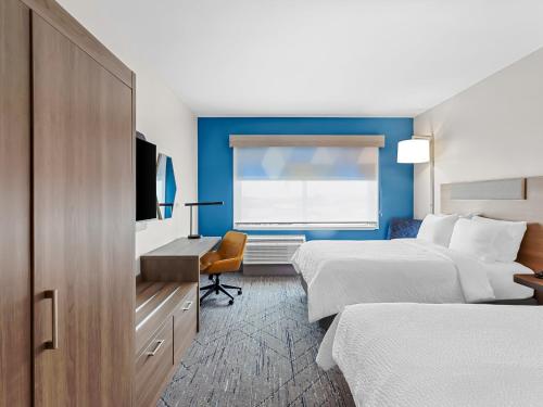 Ένα ή περισσότερα κρεβάτια σε δωμάτιο στο Holiday Inn Express Peotone by IHG