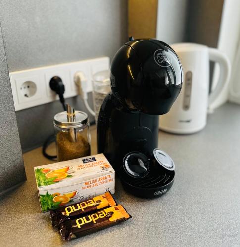 M&M Apartment II SELF CHECK-INにあるコーヒーまたはお茶