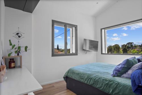 Giường trong phòng chung tại Villa Mougins