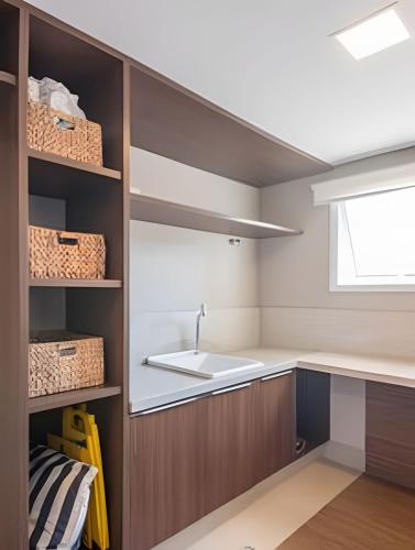 Η κουζίνα ή μικρή κουζίνα στο Moderno Apartamento no Cambuí