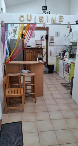 Kuchyň nebo kuchyňský kout v ubytování Chambres D'hôtes Le Bellevue -